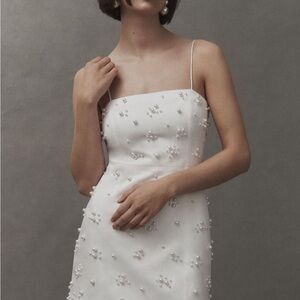 Elegant White Pearl-Embellished Dress